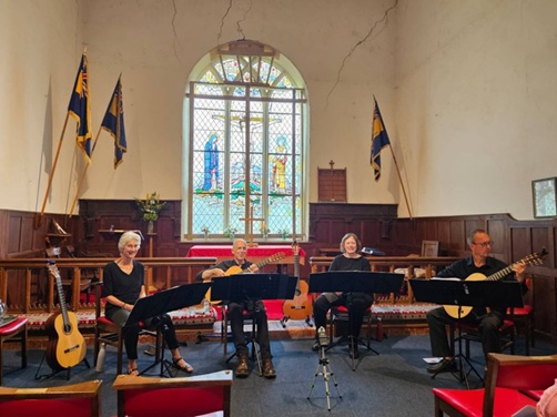 Picture of Diss Guitar Ensemble inside Laxfield Church.